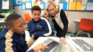 teacher with two students 